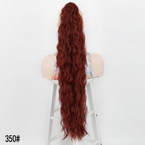 LA00023lady's hair is styled with a hair clip, a ponytail with water ripples, a fluffy long curly hair